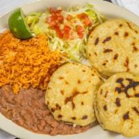 Gordita Plate · Three gorditas served with rice and beans.