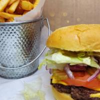 Big Tex Burger · Single Pattie Angus Chuck Beef, Mayo, Mustard, Lettuce, Tomatoes, Onions, Pickles.