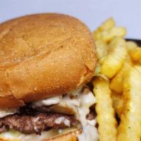 Mushroom Swiss Burger · Single Pattie Angus Chuck Beef, Mayo, Lettuce, Grilled Onions, Mushroom, Swiss Cheese.