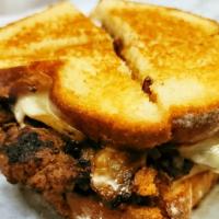 Pattie Melt · Grilled Onions, Swiss Cheese in a Texas Toast