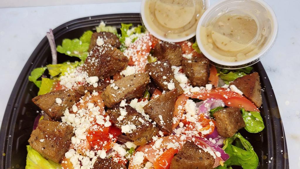 Greek Salad · Lettuce, Onion, Tomatoes, Feta Cheese, Balsamic Vinaigrette, Gyro. Greek Dressing.