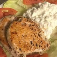 Dieter'S Delight · Grilled chicken breast served on a bed of lettuce with cottage cheese, tomato and your choic...