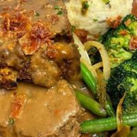 Meatloaf 2.0 · Ground beef with applewood bacon ale gravy, mashed potatoes and sautéed string beans.