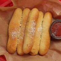 Breadsticks (5) · FIVE Warm garlicky bread sticks served with our House Marinara Sauce.. >> Please add any spe...