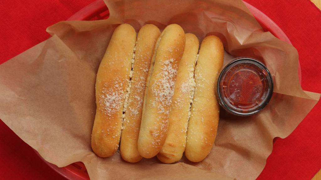 Breadsticks (5) · FIVE Warm garlicky bread sticks served with our House Marinara Sauce.. >> Please add any special requests below