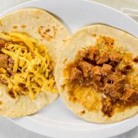 Carne Guisada · Add egg, beans, potatoes or cheese to any taco for an additional charge. Add bacon, ham, cho...