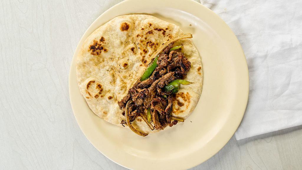 Beef Fajitas · Add egg, beans, potatoes or cheese to any taco for an additional charge. Add bacon, ham, chorizo, sausage or guacamole for an additional charge.