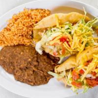 Puffy Tacos · Light and crisp puffy tacos filled with chicken or beef.