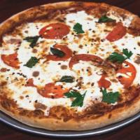 Large Margherita Pizza · Mozzarella Cheese, Sliced Plum Tomato, Fresh Basil
