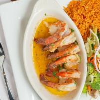Camarones Al Ajillo · Six jumbo shrimp, in a Garlic-cilantro butter, white wine, and fresh lime juice. Served with...