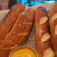 Soft Pretzels · 4 pretzels served with a garlic and beer cheese sauce.