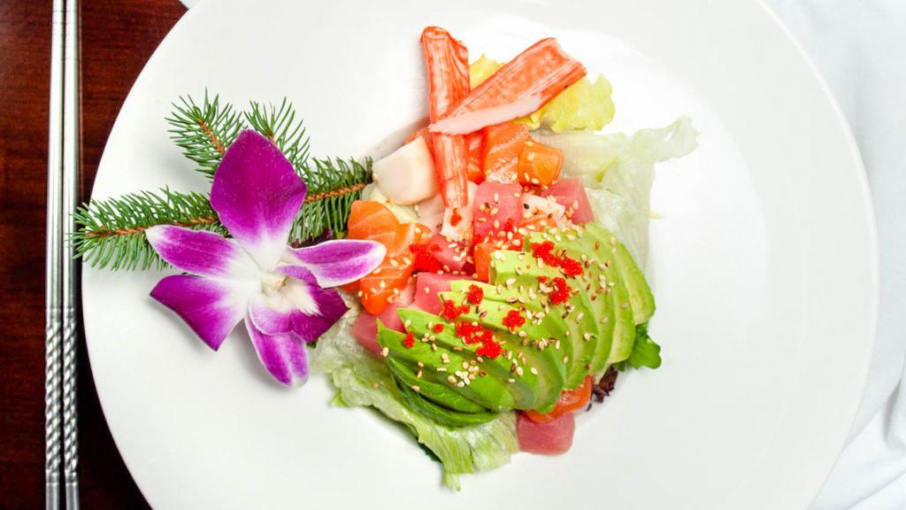 Sashimi Salad · Tuna, salmon and white fish with avocado and mixed greens in yuzu sauce.