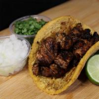 Al Pastor · Three Freshly pressed corn tortilla tacos with cooked to order Al Pastor meat. The order inc...