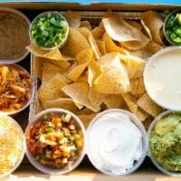 Nacho Box · Chicken tinga or Ground Beef served with tortilla chips, frijoles, jack cheese, pico de gall...