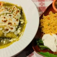 Enchiladas · Three corn tortillas stuffed with cheese, beef, chicken, spinach or seafood covered with mel...