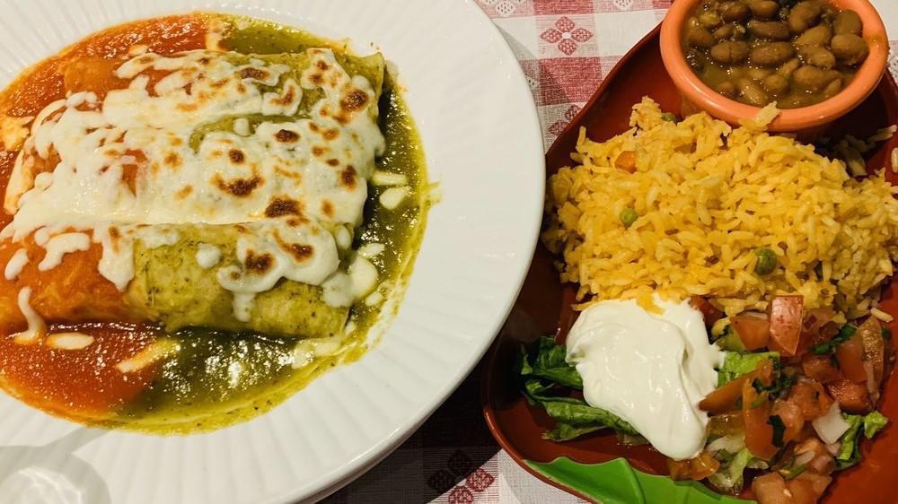 Enchiladas · Three corn tortillas stuffed with cheese, beef, chicken, spinach or seafood covered with melted cheese topped with a home-made sauce. All enchiladas are served with beans and rice, pico de gallo and sour cream with your choice of red or green sauce.

No protein combination