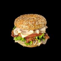Turkey Club · Oven Roasted Turkey, Hardwood Smoked Bacon, American Cheese, Lettuce, Tomato, Mayo