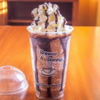 K'La Frozen Mocha · Espresso, vanilla syrup, chocolate sauce, cocoa, milk, blended with ice, topped with whipped...