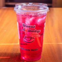 Pomegranate Iced Tea · Premium green tea blended with pomegranate seeds brewed daily.