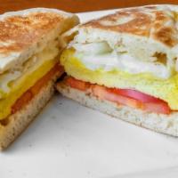 The Original Egg Sandwich · 2 farm fresh eggs, red onion, tomato, American cheese, on a toasted English muffin.