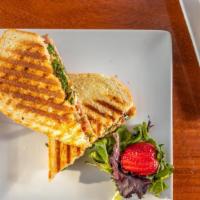 Italian Fig Panini · Fresh sliced prosciutto, fig jam, goat cheese, prosciutto, arugula, grilled, served on our s...