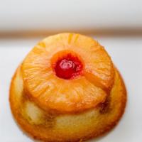 Pineapple Upside-Down · Original Vanilla Cakes with Caramelized brown sugar and a sweet pineapple & cherry on top.