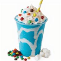 Cotton Candy Shake · Marshmallow cream swirl and Blue Cotton Candy Ice Cream topped with whip cream and mini M&M’...