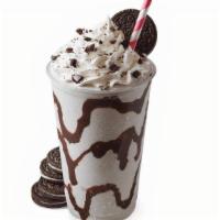Cookies & Cream Shake · Hershey’s® chocolate swirl, Oreo® cookie pieces, and Sweet Cream Ice Cream topped with whipp...