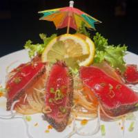 Pepper Tuna Tataki · 9 pieces of seared pepper tuna served with homemade ponzu sauce.

*Consuming raw or undercoo...