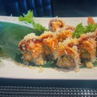 Tiger Roll · cooked. Shrimp tempura, cucumber topped with spicy crab meat, spicy Mayo, and eel sauce.