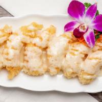 Coconut Shrimp (6) · Tempura fried shrimp with coconut sauce.