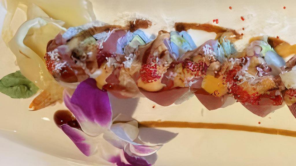 Ban Ban Roll · Shrimp tempura, crab stick, avocado topping with tuna, crunch, spicy mayo & eel sauce.