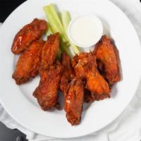 Buffalo Wings · Choose house hot sauce or BBQ (10)