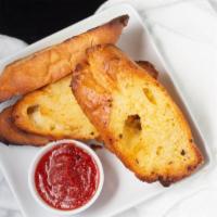 Garlic Bread · Toasted French bread with fresh garlic & butter. Add cheese with an additional charge.