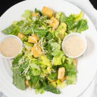 Small Caesar Salad · Crisp romaine, gourmet Caesar dressing, pecorino romano and gourmet croutons.