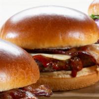 Ragin Cajun Burger · 1/4lb Angus Burger with Blackened Voodoo & Hot Shot, Applewood Bacon & Pepperjack Cheese
