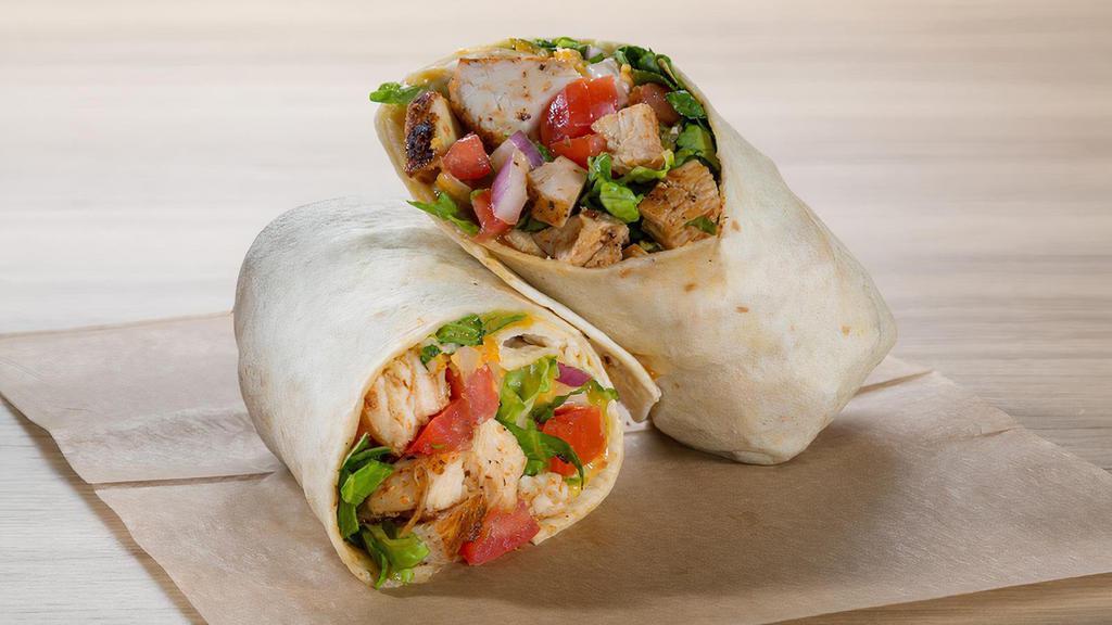 Buffalo Tender Wrap · Hand Breaded Tenders, Choice of Flavor with Lettuce, Tomato, Onion, Cheese