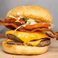 Bacon Cheeseburger · Two patties with bacon, American cheese, lettuce, tomato, mayonnaise and onion.