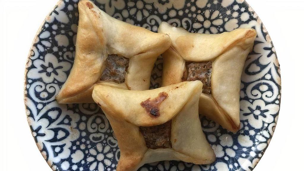 Sfiha Meat Pies · Ground beef, onion, and pine nuts.