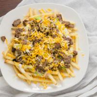 Carne Asada · Meat, fries, beans, guacamole, sour cream and cheese