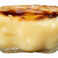 Pastel De Nata · A Portuguese egg custard tart pastry. Outside Portugal,  they are particularly popular in ot...