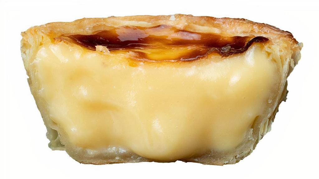 Pastel De Nata · A Portuguese egg custard tart pastry. Outside Portugal,  they are particularly popular in other parts of Western Europe, Asia.