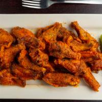 Wings · A loaded basket of tender chicken wings, served with your choice of bleu cheese or ranch dre...