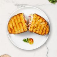 Turn In The Tuna Melts Panini · Tuna and melted cheese on your choice of toasted bread.