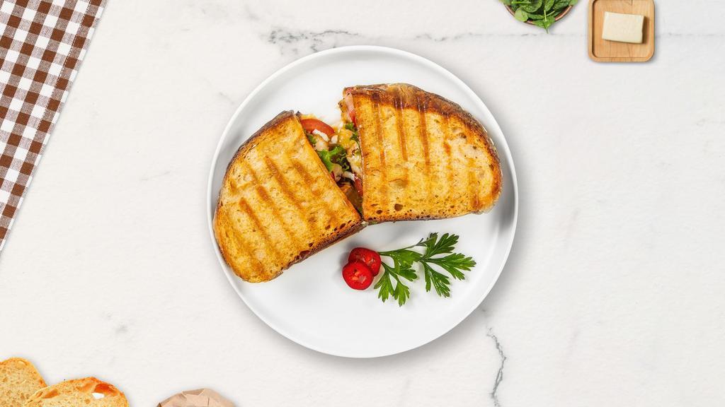 Bongiorno Panini · Grilled chicken, mozzarella cheese, roasted peppers, and pesto sauce on your choice of toasted bread.