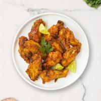 Mustard Glaze Wings · Fresh chicken wings fried and tossed in honey mustard sauce. Served with your choice of dipp...