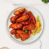 Buffalo High Wings  · Fresh chicken wings fried and tossed in our buffalo wing sauce. Served with your choice of d...