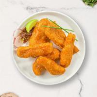 Ride The Buffalo Tenders · Chicken tenders fried until golden brown before being tossed in buffalo sauce. Served with y...