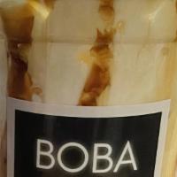Brown Sugar Boba Milk · Soft and chewy boba pearls with housemade brown sugar syrup and topped with half and half.