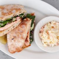 Grilled Salmon Ciabatta · Spinach, red onion, tomato, cucumbers, roasted sesame sauce, toasted roll.